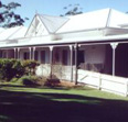 Woodleigh Homestead B&B - Logo